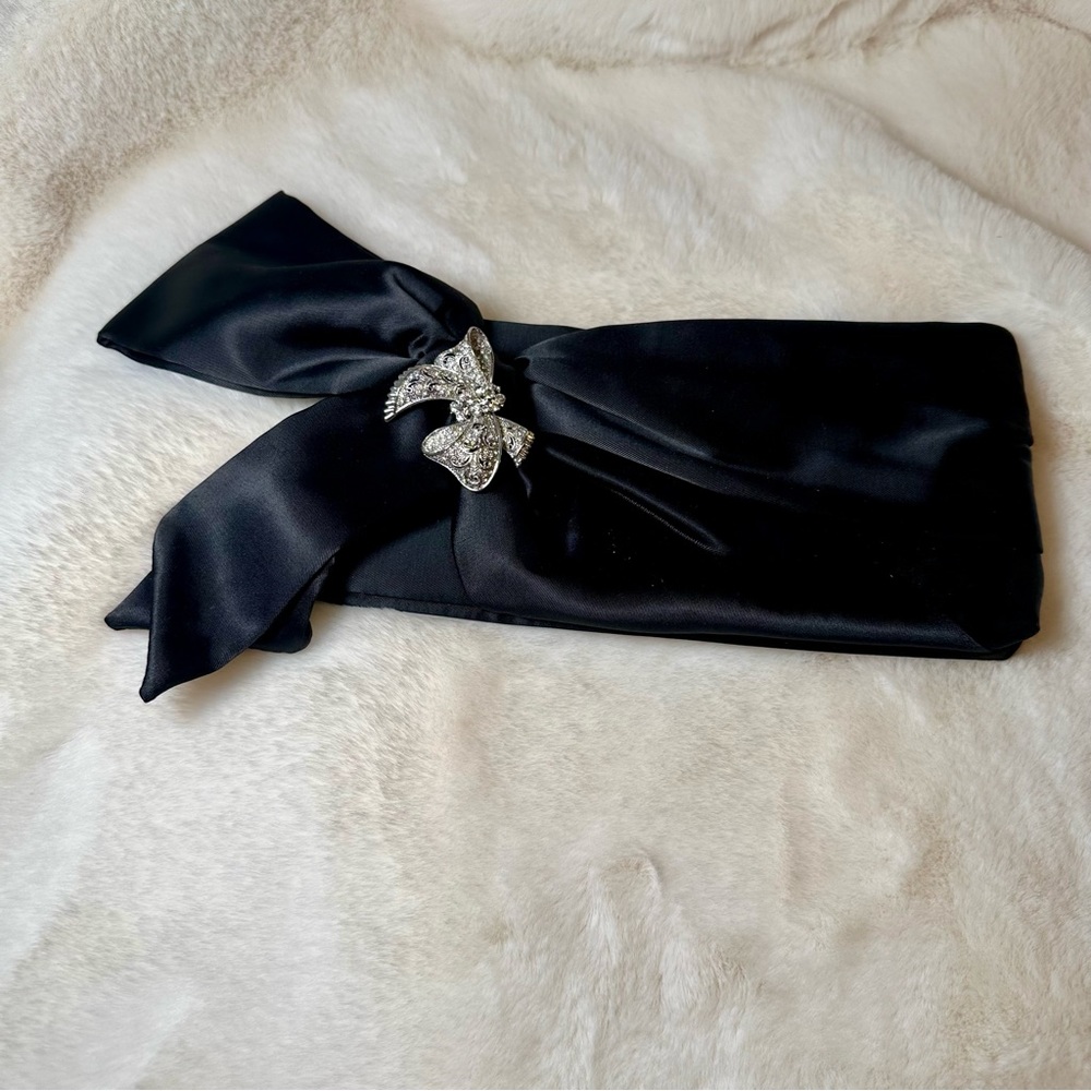 Steve Madden Black Clutch with Silver Bow Accent